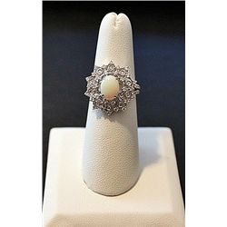 18K GOLD DIAMOND AND OPAL RING