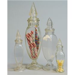 Lot of 4 Glass Countertop Candy Jars w/ Pointed Lids