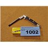 Image 1 : 2 switchblade combs