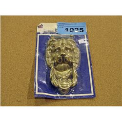 Brass lion head door knocker
