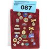 Image 1 : One padded display set of assorted collectors pins