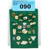 Image 1 : One padded display set of assorted collectors pins