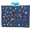 Image 1 : One padded display set of assorted collectors pins