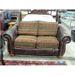 Burgandy leather with upholstered cushions