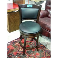 Black leather padded swivel bar stool
