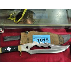 Large hunting knife with leather sheath
