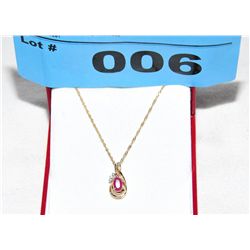 14Kt Gold Diamond and Ruby Necklace