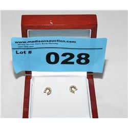 14Kt Gold earrings set with 18 Diamonds