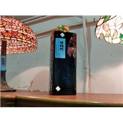 Perfume bottle advertisment; Dior Addict