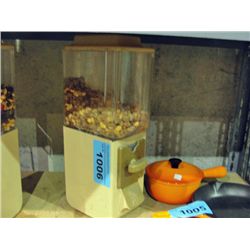 Coin operated peanut dispensor