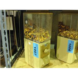 Coin operated peanut dispensor