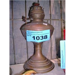 Early copper oil lamp