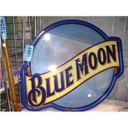 Blue moon framed advertisment sign