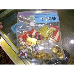 Bag of assorted military pins and buttons
