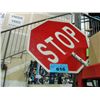 Image 1 : Workman roadwork sign; stop and slow