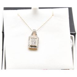 10k gold with .58 carat diamond pendant and