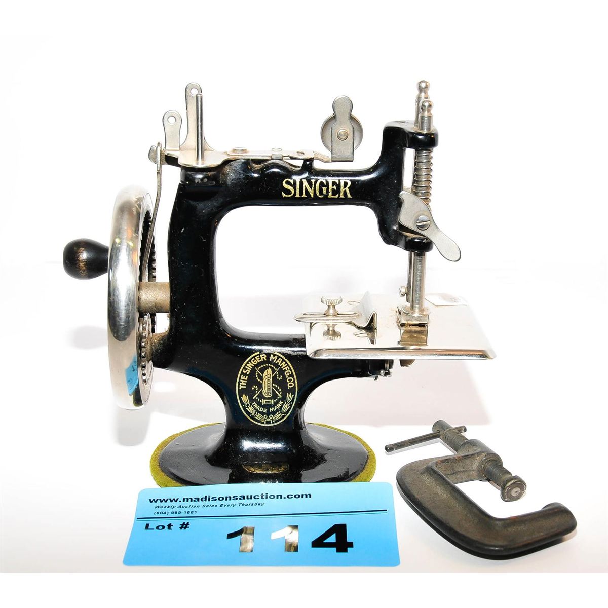 Vintage singer hand crank childs toy sewing machie