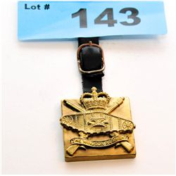 Brass windsor regiment badge with leather