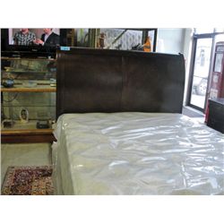 Queen mahogany finish bed;