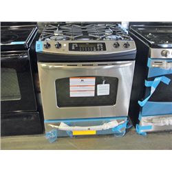 GE stainless steel and black gas stove