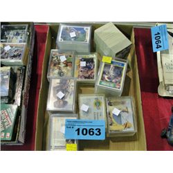 Box of assorted sports collectors trading cards