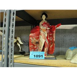 Japanese geisha girl figurine