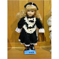 Porcelain collectors doll
