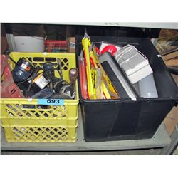 Yellow milk crate and black bin of tools hardware