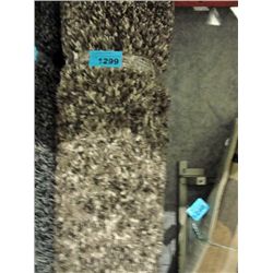 Large multi colored beige shag area rug