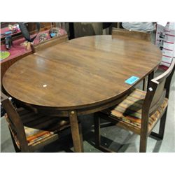 Walnut dining table with one leaf and 4 chairs