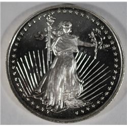 A ONE OUNCE .999 SILVER ART ROUND FEATURING A STANDING LIBERTY