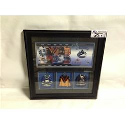VANCOUVER CANUCKS WALL MOUNT SHOWCASE WITH 3 MINI