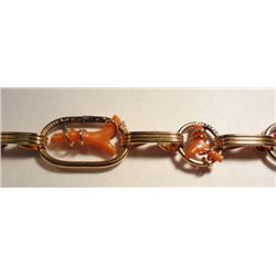 Vintage Coral Bracelet, gold gilled with wire wrapped around coral. 7 1/2" long.