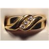 Image 1 : Ladies 14k Yellow Gold Ring with Diamonds, Three round diamonds channel set.