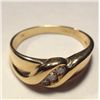 Image 2 : Ladies 14k Yellow Gold Ring with Diamonds, Three round diamonds channel set.