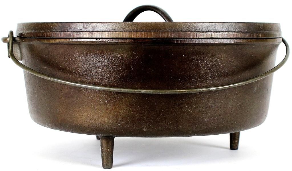 No. 12 cast iron Dutch oven with tripod stand.