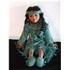 Image 1 : Porcelain Indian Doll from the Hamilton Collection Turquoise color and fringed leather dress on this