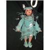 Image 2 : Porcelain Indian Doll from the Hamilton Collection Turquoise color and fringed leather dress on this