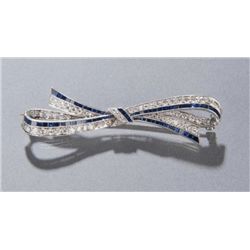 Tiffany & Co. platinum, gold ribbon brooch.