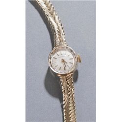 Schwartzchild lady's 14KT gold wrist watch.