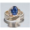 Image 1 : Oval tanzanite and diamond ring.