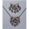 Image 1 : Group of 2 gold floral ruby & diamond pendants.