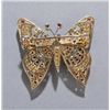 Image 2 : 18KT gold butterfly brooch set with gems.