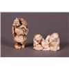 Image 1 : 2 ivory netsukes: man carrying fish, 2 men.