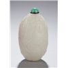 Image 1 : An off-white jade snuff bottle in fruit form.