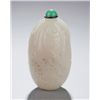 Image 2 : An off-white jade snuff bottle in fruit form.