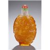 Image 1 : An amber glass overlay on snowflake snuff bottle.