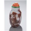 Image 2 : A rounded carnelian snuff bottle.
