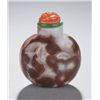Image 3 : A rounded carnelian snuff bottle.