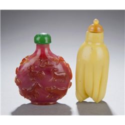 2 glass snuff bottles, red/pink and yellow citron.